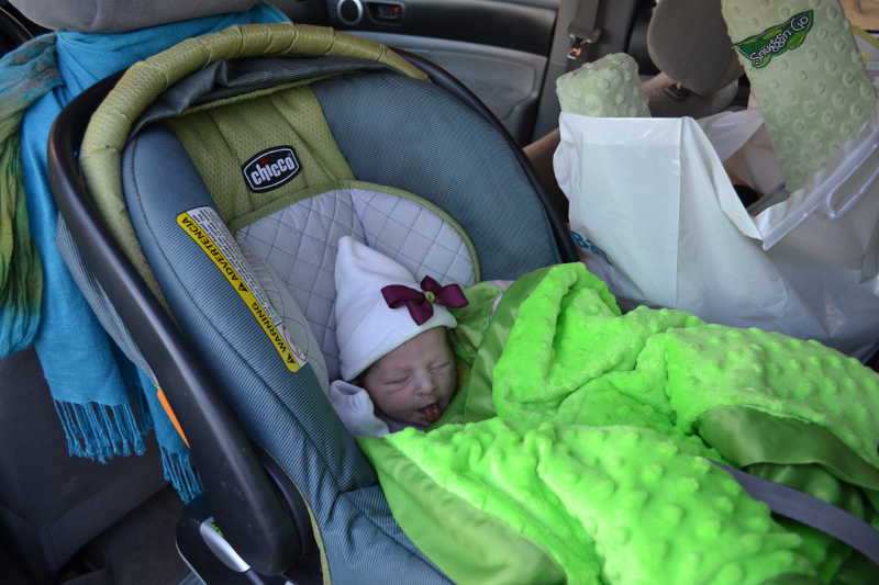 Priya's first time in a car seat