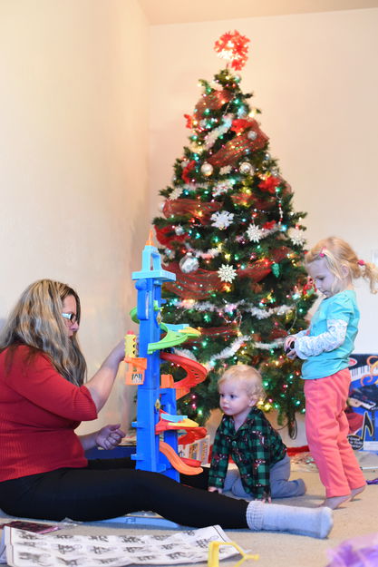 Jen assembles Christmas toys