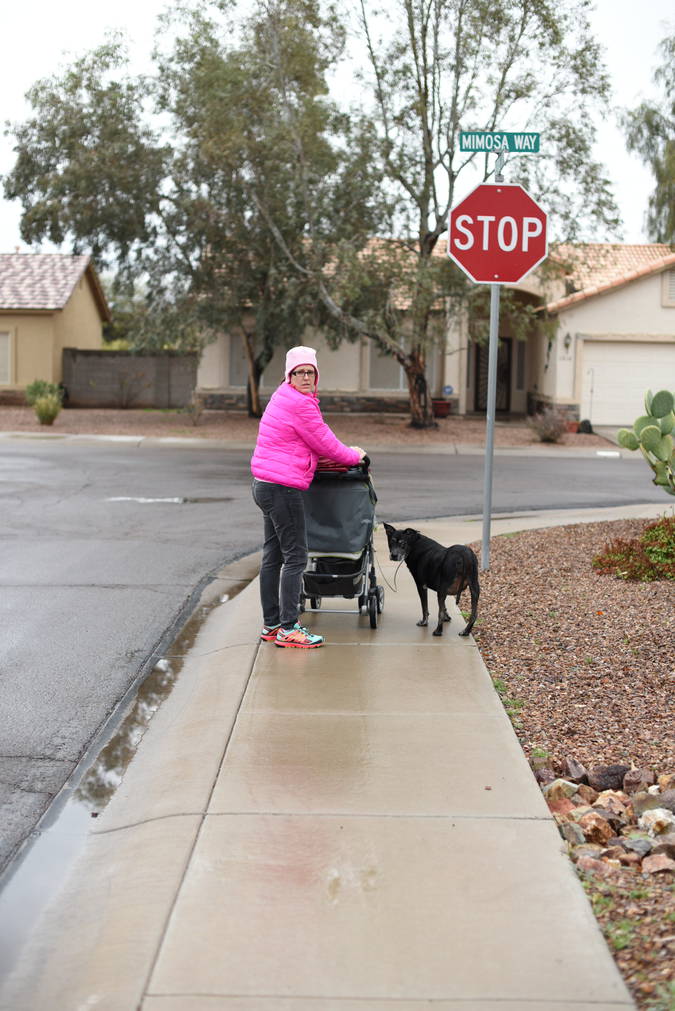 Jen walking Simone in the rain