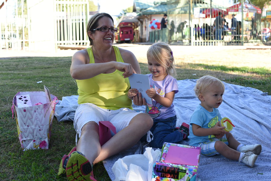 Priya's third birthday, opening presents