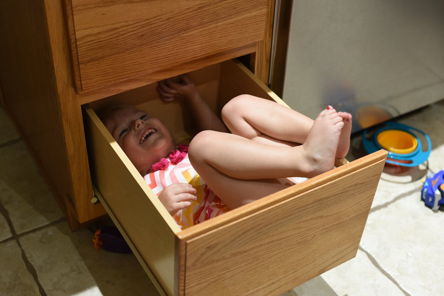 Priya in kitchen drawer