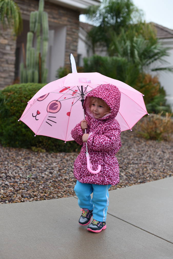 Priya with her pink umbrella