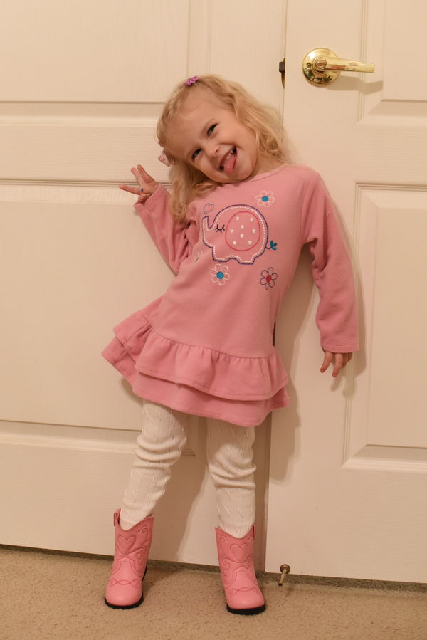Priya in her Christmas boots from grandma