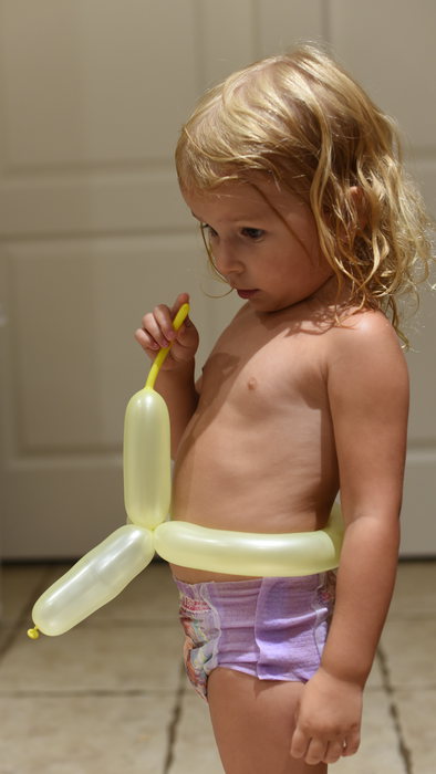 Priya with a balloon belt