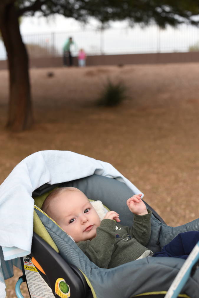 Remy in his stroller while mom and Priya run around