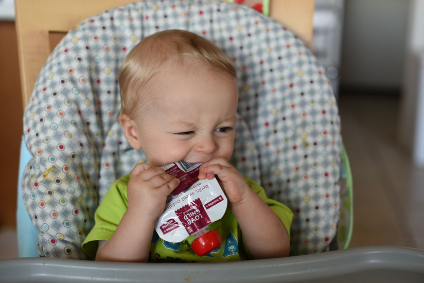 Remy eats the food packaging