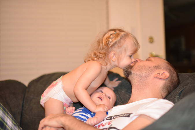 Priya giving dad a kiss