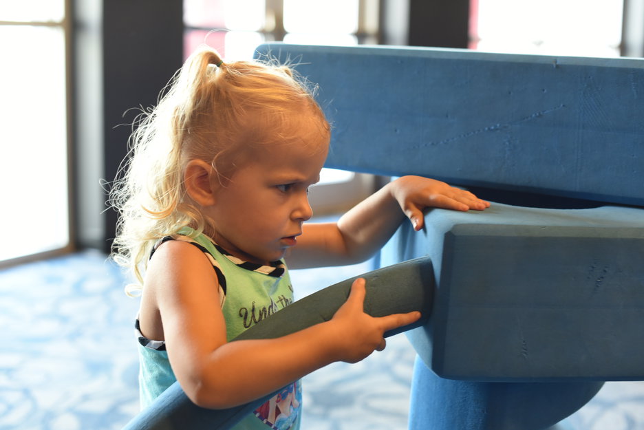 Priya & Remy playing blocks at space center