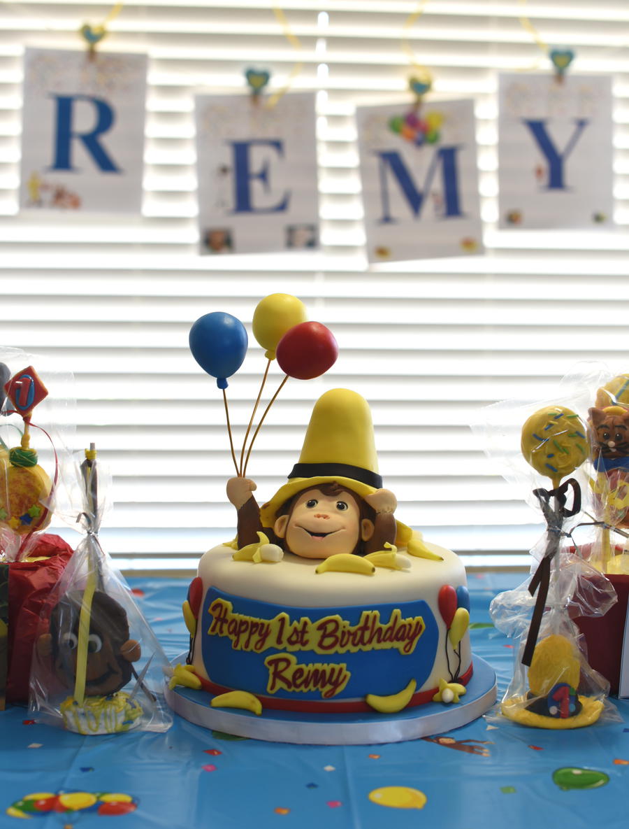 Remy's Curious George first birthday cake