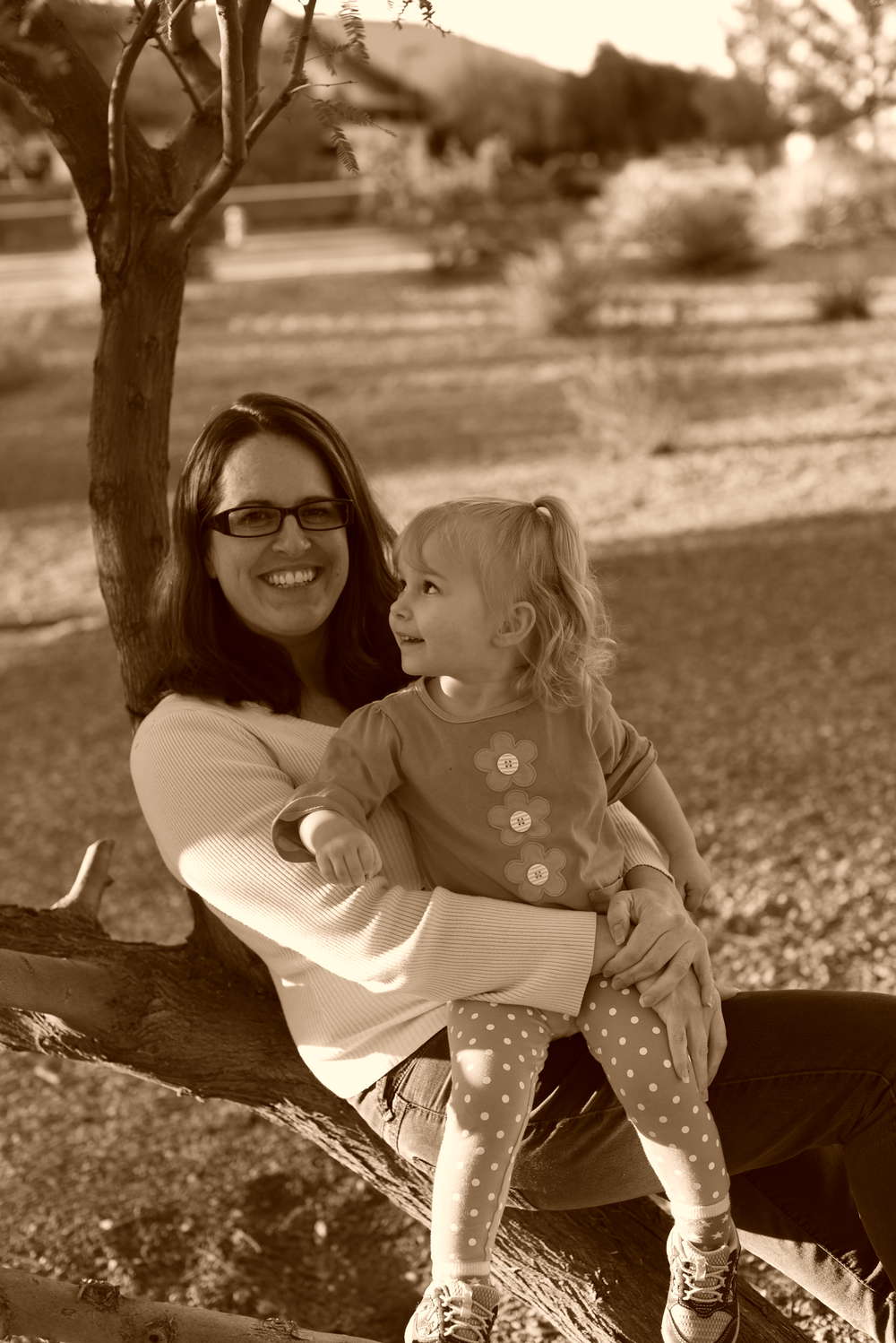 Jen and Priya sitting in a "sepia" tree